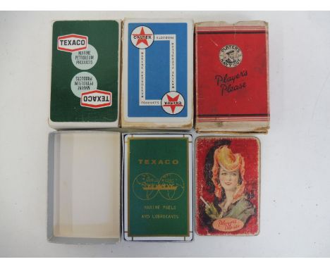 Four sets of complete playing cards including Texaco Marine fuel cards, Caltex etc.