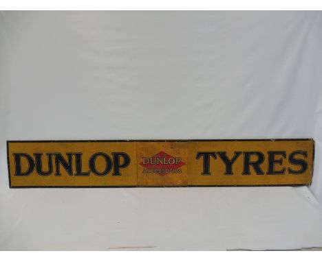 A Dunlop Tyres three piece tin advertising sign, in good condition, 73 x 11 1/2".