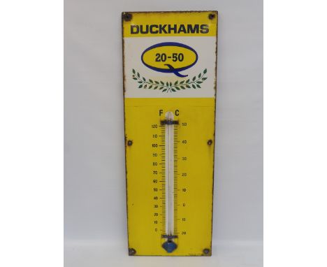 A Duckhams 20-50 enamel thermometer by Burnham, 13 x 36". 