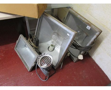 3 vintage floodlights and a heat lamp