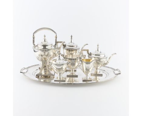 Gorham Manufacturing Company, United States. A six piece sterling silver tea set with a sterling silver tray. All pieces in t