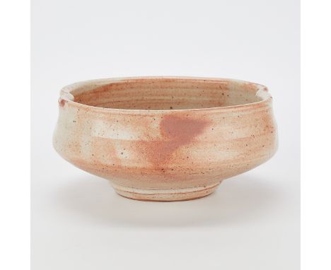 Warren MacKenzie (American, 1924-2018). Studio pottery altered ceramic bowl. Shino glazed stoneware. Stamped along the footri