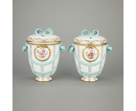 K.P.M., Germany. Pair of porcelain urns or lidded vase vessels decorated with hand-painted insects along the lid and floral s
