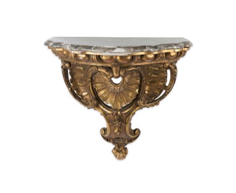 French carved wooden wall bracket or shelf in the style of Louis XIV, 20th century. With gilt finish and a grey marble top, c