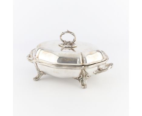 Electroplated silverplate serving dish with lid, liner and base. The dish with ornate feet, handles and final. Marked EP at t