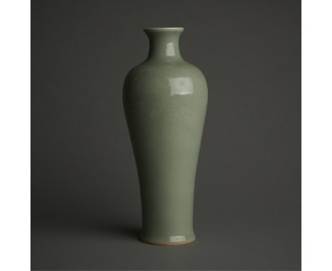 Chinese Qing porcelain vase with a celadon glaze and incised floral decoration. Drilled, marked under the drill hole.Height: 