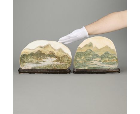 Attributed C.C. Wang (Chinese, 1907-2003). Group of two skillfully carved Chinese scholar's rocks depicting mountainous lands