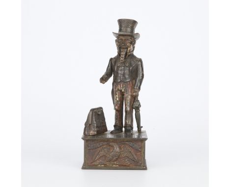 Shepard Hardware Company, United States. Cast iron and pigment "Uncle Sam" mechanical coin bank, late 19th century. When the 