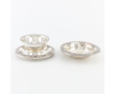 Two pieces of Wallace sterling bowls in the Grand Baroque pattern. One sauce bowl with affixed drip tray, the drip tray with 