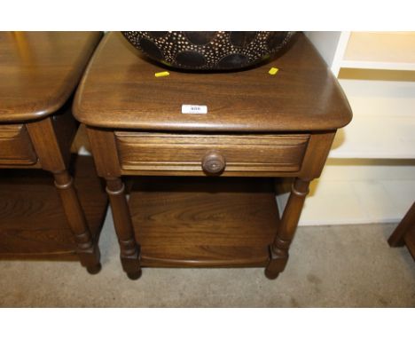 An Ercol lamp table fitted single drawer 