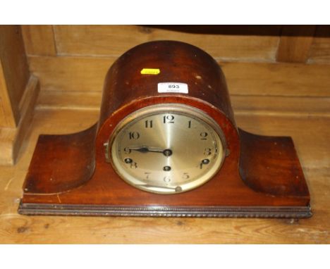 A mahogany cased three hole mantel clock 