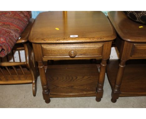 An Ercol lamp table fitted single drawer 