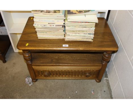 An Ercol tv stand fitted single drawer