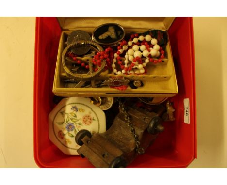 A box containing a small model cannon; a leather cigar case ; a Pandora style bracelet; compact etc. 