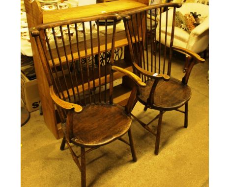 A pair of elm stick back Windsor chairs