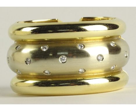 Vintage Florence, Italy 18 Karat Yellow Gold Hinged Cuff Bangle Bracelet Inset with Thirteen Round Cut Diamonds. Diamonds F-G