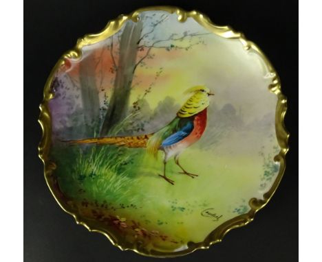 19/20th Century Hand Painted Limoges Decorative Plate. "Colorful Bird in Landscape" Artist Signed Lower Right Couderb, also t