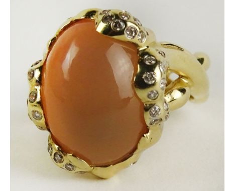 Lady's Vintage Moonstone and 14 Karat Yellow Gold Ring Accented with Small Round Cut Diamonds. Moonstone Measures 17mm x 12mm