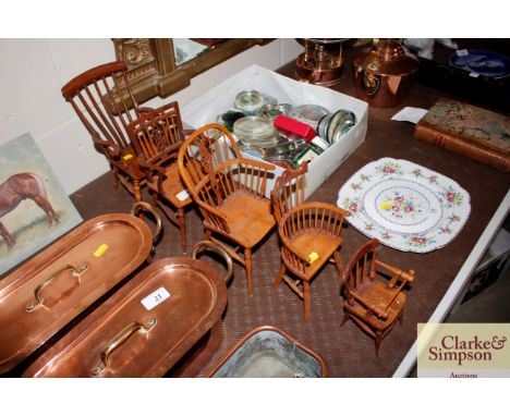 A collection of five signed Stuart King wooden miniature Windsor and other stick back chairs