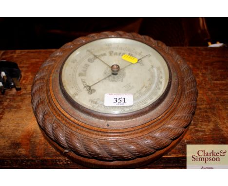 A Short &amp; Mason barometer in oak rope twist frame 