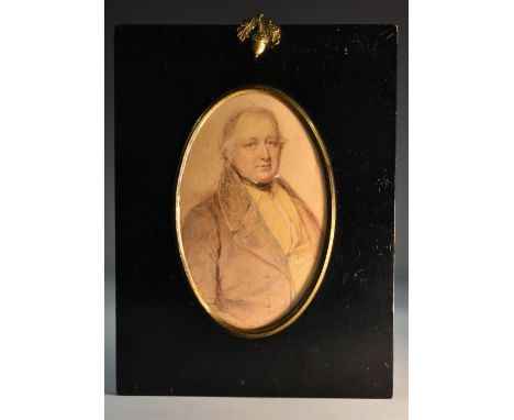 English School (second quarter, 19th century), a portrait miniature, of a gentleman of means, half-length, wearing a dark coa