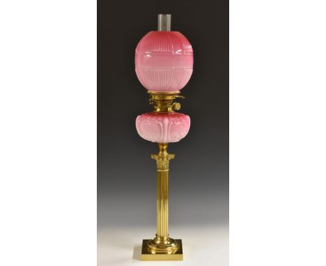 A Victorian opaque cranberry glass and gilt-brass oil lamp, Hinks No. 1 Safety, fluted ovoid shade moulded in relief with a c
