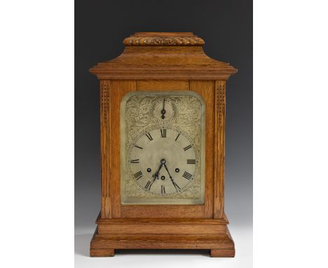 A late 19th century German oak bracket clock, by Gustav Becker, the slightly arched dial with Roman numerals, Chime/Silent di