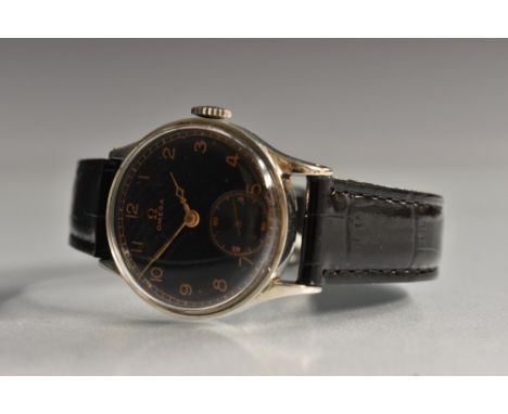Omega - a vintage 1920's wristwatch, black dial, rose gold coloured Arabic Numerals, minute track, subsidiary seconds, gilt h