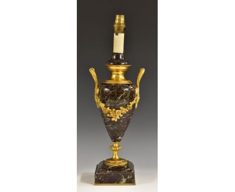 A 19th century Louis XVI Revival gilt-metal mounted specimen marble inverted baluster vase, the front applied with a garland 