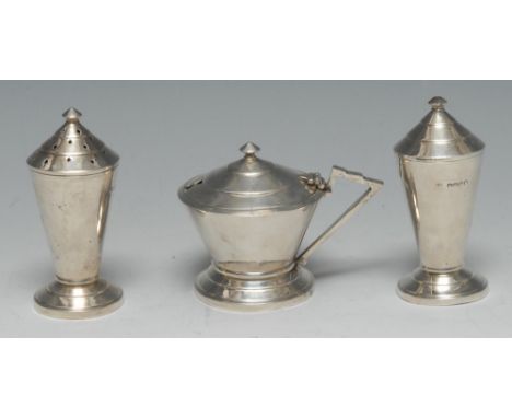 An Art Deco silver three piece conical condiment set, comprising salt, pepper and mustard, stepped geometric covers and bases