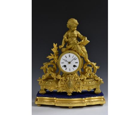 A 19th century French gilt metal mantel clock, 7.5cm enamel dial inscribed with Roman numerals, twin winding holes, 14-day mo