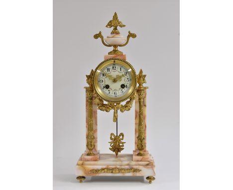 A Louis XVI style gilt metal mounted marble portico clock, 8.5cm circular enamel dial with Roman numerals and swags of flower