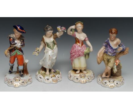 A set of four Royal Crown Derby figures, Allegorical of the Seasons, Spring, she stands, bare footed with two floral rings, l