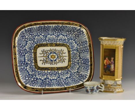 An 18th century miniature toy teacup, decorated with overglaze enamels and underglaze blue, picked out in gilt, 5cm diam; a B