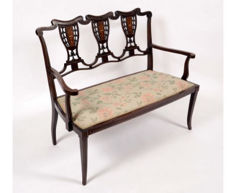 A late Victorian mahogany, rosewood and marquetry chair-back salon sofa, shaped cresting rail above three pierced urnular spl