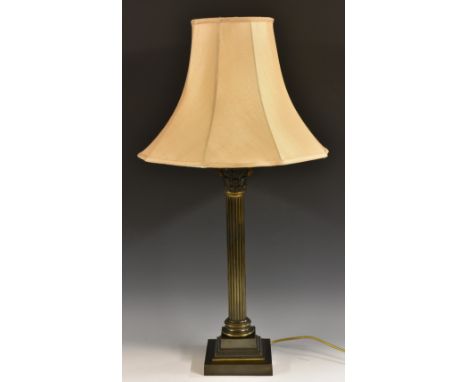 An early 20th century brown patinated Corinthian table lamp, the capital typically cast with acanthus, leaves and scrolls, fl
