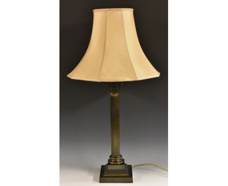 An early 20th century brown patinated Corinthian table lamp, the capital typically cast with acanthus, leaves and scrolls, fl