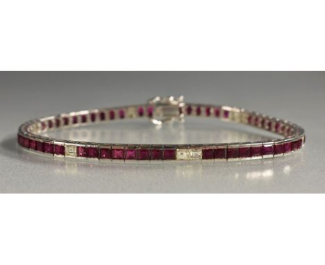 A diamond and ruby tennis bracelet, linear inset with fifty seven square rubies and nine conforming diamonds, 18ct white gold