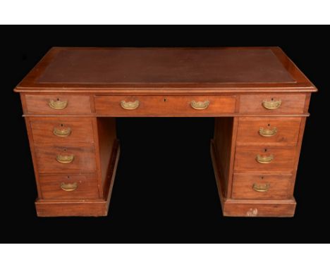 A Victorian mahogany twin pedestal desk, moulded top above three frieze drawers, three further drawers to each pedestal, plin