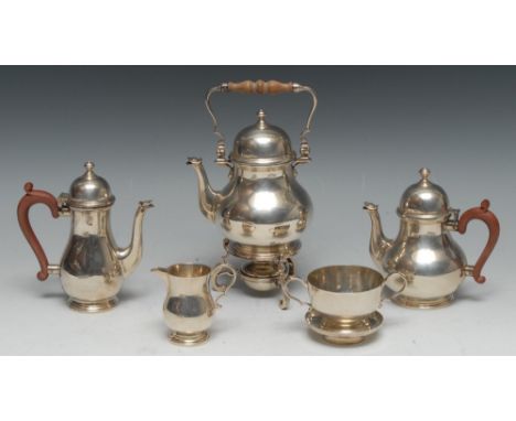 A George I style silver matched five piece bachelor's tea and coffee service, comprising tea and coffee pots, spirit kettle o