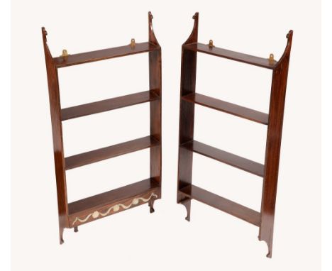 A pair of Chinese hardwood and mother of pearl marquetry wall shelves, each with scroll terminals above four open tiers and a
