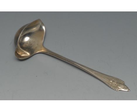 A Georg Jensen silver sauce ladle, the haft cast with bell tendril, l GI and 925 marks