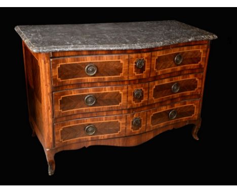 An 18th century North Italian walnut serpentine commode, grey marble top above three long graduated crossbanded drawers, bras