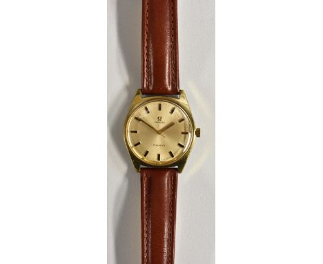 Omega - a retro 1960's Geneve wristwatch, silvered sunburst dial, raised baton markers, minute track, centre seconds, gold ha