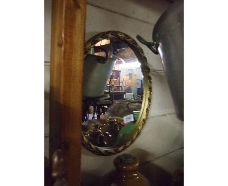 ROUND GILT FRAMED MIRROR