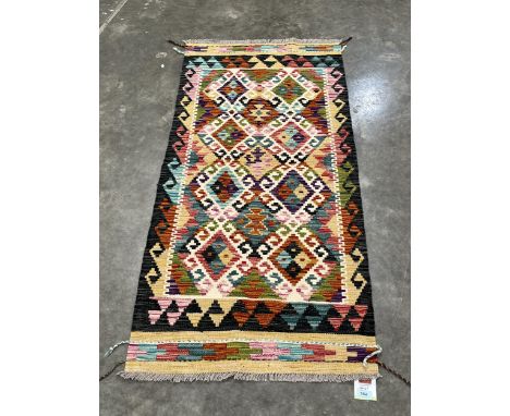 A Chobi Kilim carpet runner. 1.44m x 0.67m 