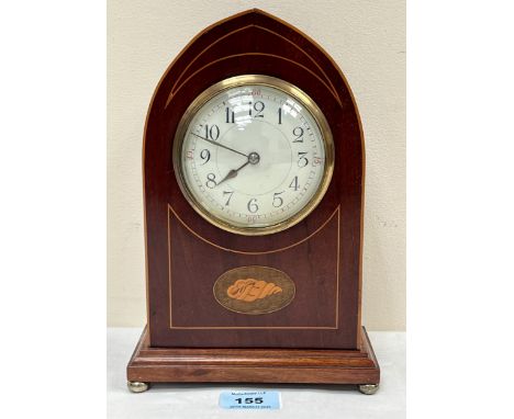 An Edward VII mahogany line and shell inlaid lancet cased mantle clock, the brass drum movement with platform lever escapemen
