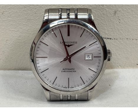 A Longines Record Automatic Chronometer stainless steel gentleman's wristwatch, the frosted silvered dial with date aperture.