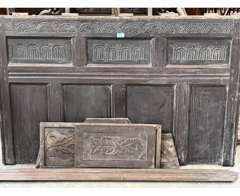 A section of 17th century joined oak wall panelling, 34" x 54", with other later small panels