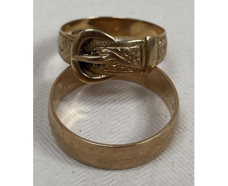 A 9ct wedding ring and a 9ct buckle ring. 6g